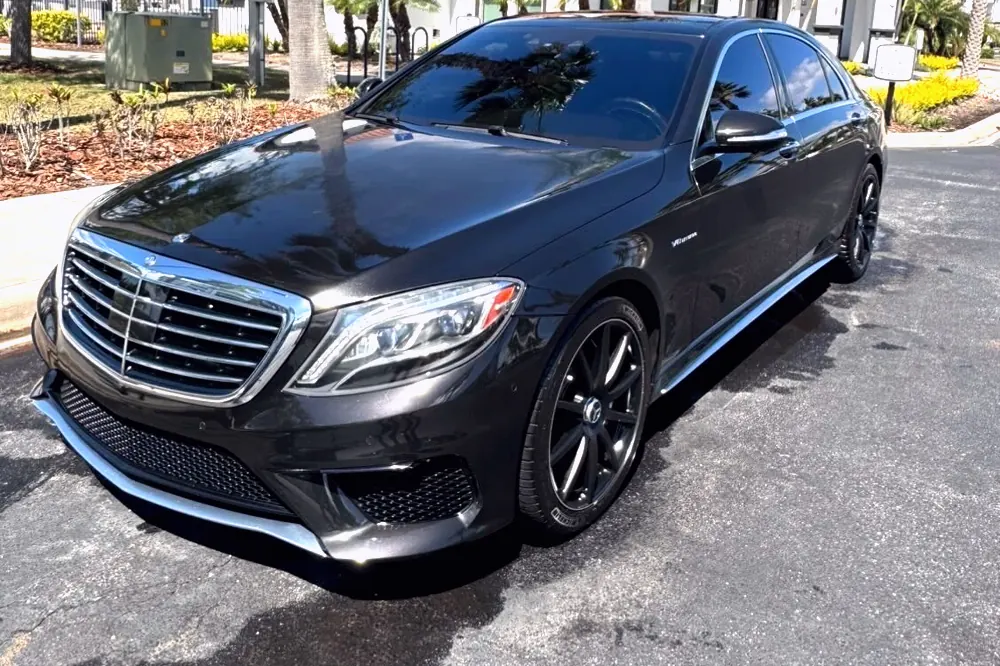A black Mercedes AMG S-Class with a mirror finish after a GaliGloss exterior detail